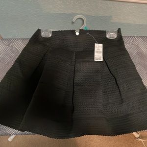 Hot gal Black ribbed mini skirt.